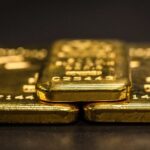 گسترش مذاکرات تجاری،‌ سرمایه‌ها را از بازار طلا بیرون آورد